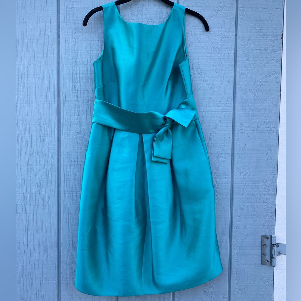 Gorgeous teal bubble dress with bow detail at the waist; great for cocktail